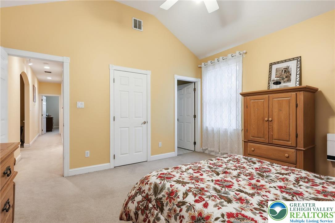 5217 Cider Press Road Schnecksville, PA 18078 - Photo 32 of 54 a bedroom with a bed and a cabinets