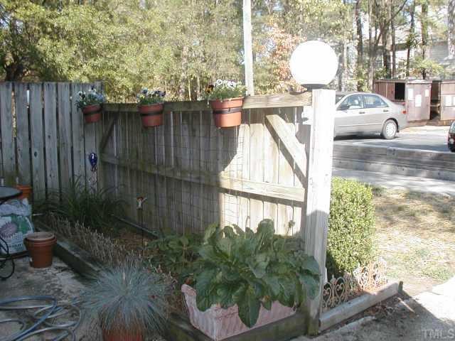 4319 Lake Ridge Drive, Unit 9B Raleigh, NC 27604 - Photo 10 of 10 a view of outdoor space and garden