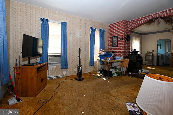313 Sassafras Street Millville, NJ 08332 - Photo 10 of 25 a room with gym equipment and a flat screen tv