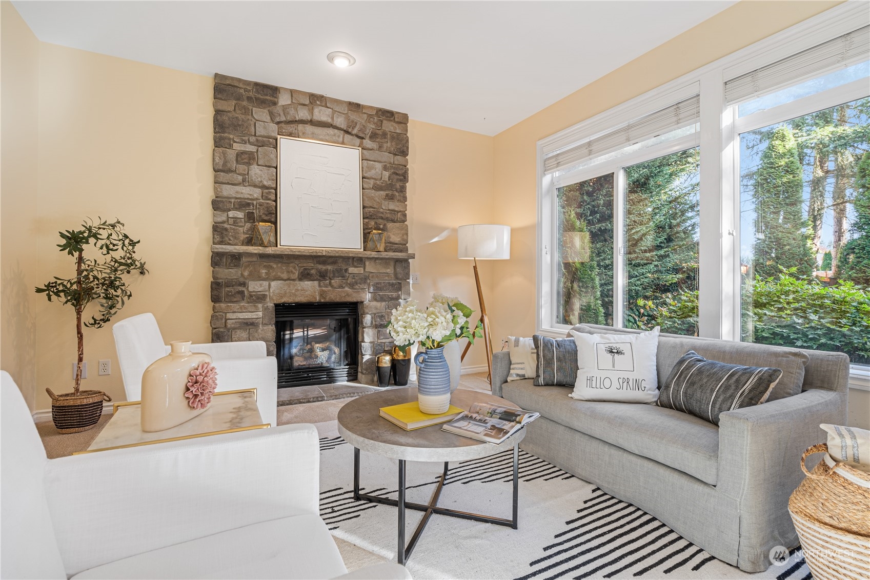 18529 33rd Avenue Southeast Bothell, WA 98012 - Photo 16 of 40 a living room with furniture and a fireplace