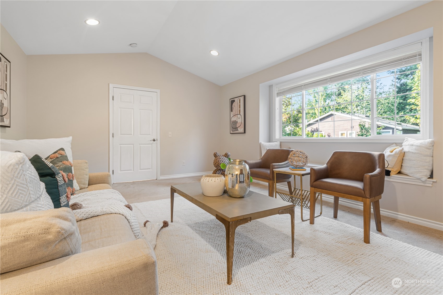 18529 33rd Avenue Southeast Bothell, WA 98012 - Photo 20 of 40 a living room with furniture and a large window