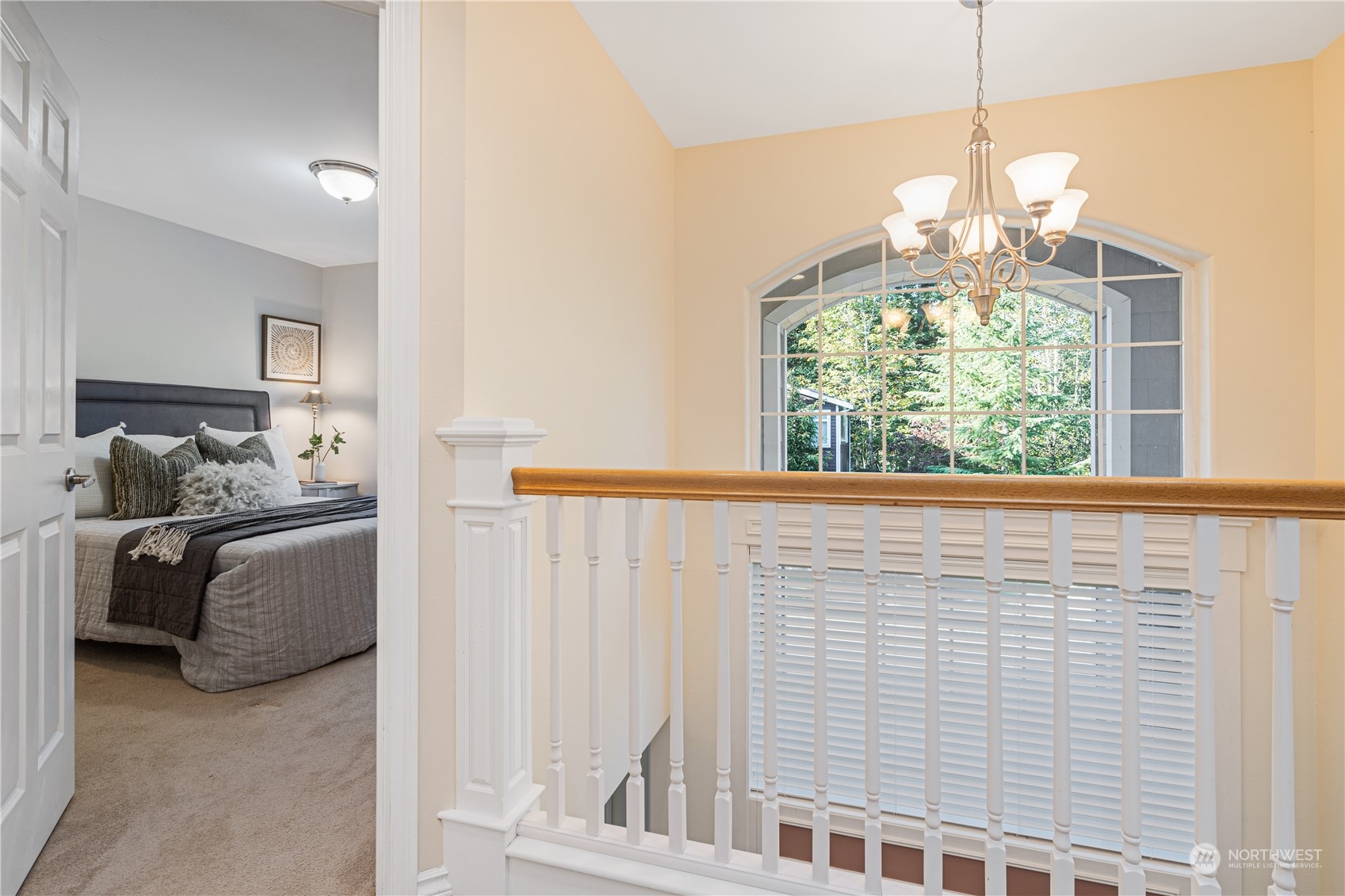 18529 33rd Avenue Southeast Bothell, WA 98012 - Photo 21 of 40 a dining room with furniture and a chandelier