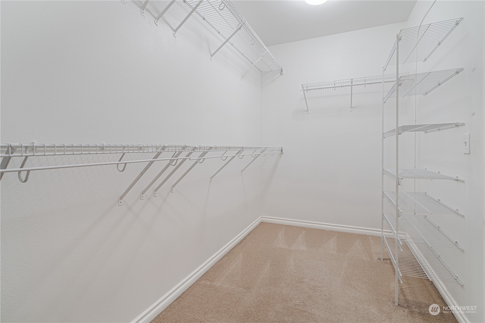 18529 33rd Avenue Southeast Bothell, WA 98012 - Photo 27 of 40 a view of a room with racks on the wall