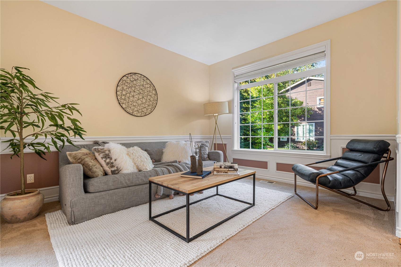 18529 33rd Avenue Southeast Bothell, WA 98012 - Photo 3 of 40 a living room with furniture and a large window
