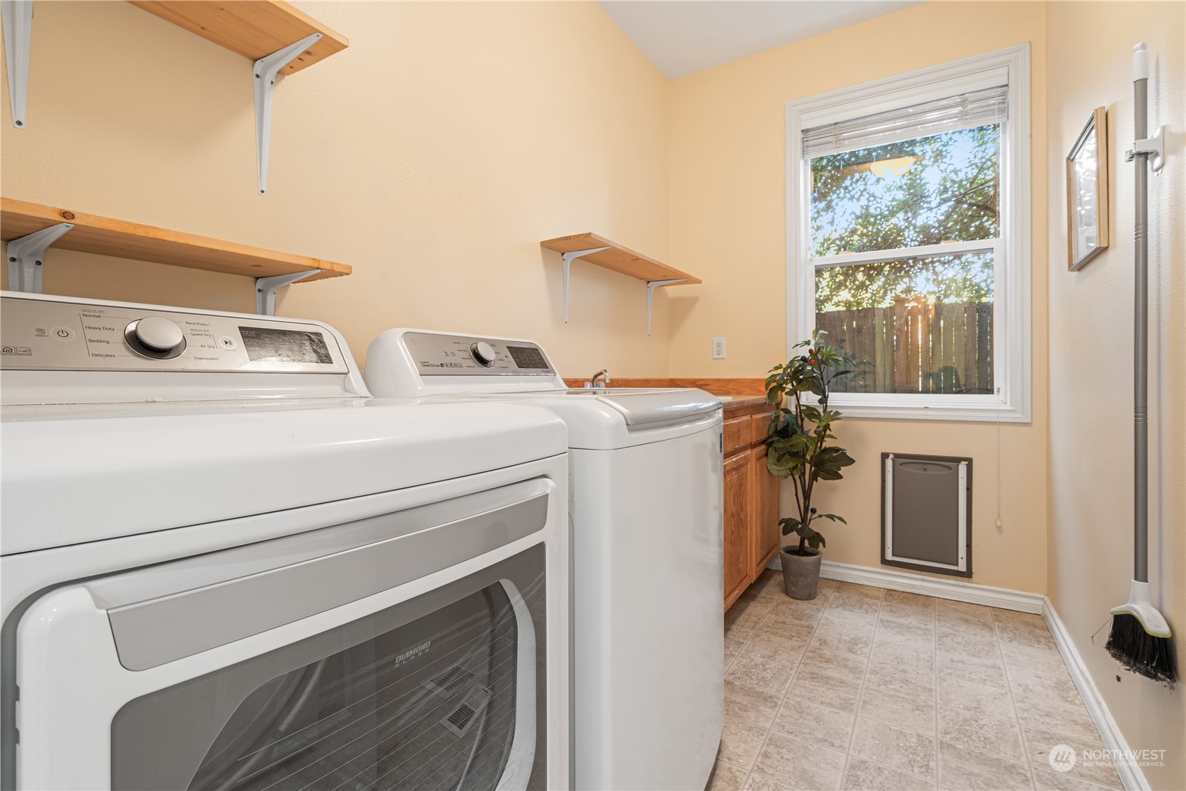 18529 33rd Avenue Southeast Bothell, WA 98012 - Photo 35 of 40 a utility room with dryer and washer