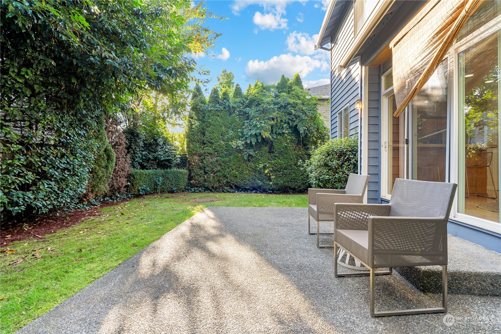 18529 33rd Avenue Southeast Bothell, WA 98012 - Photo 36 of 40 a view of a patio with table and chairs and potted plants