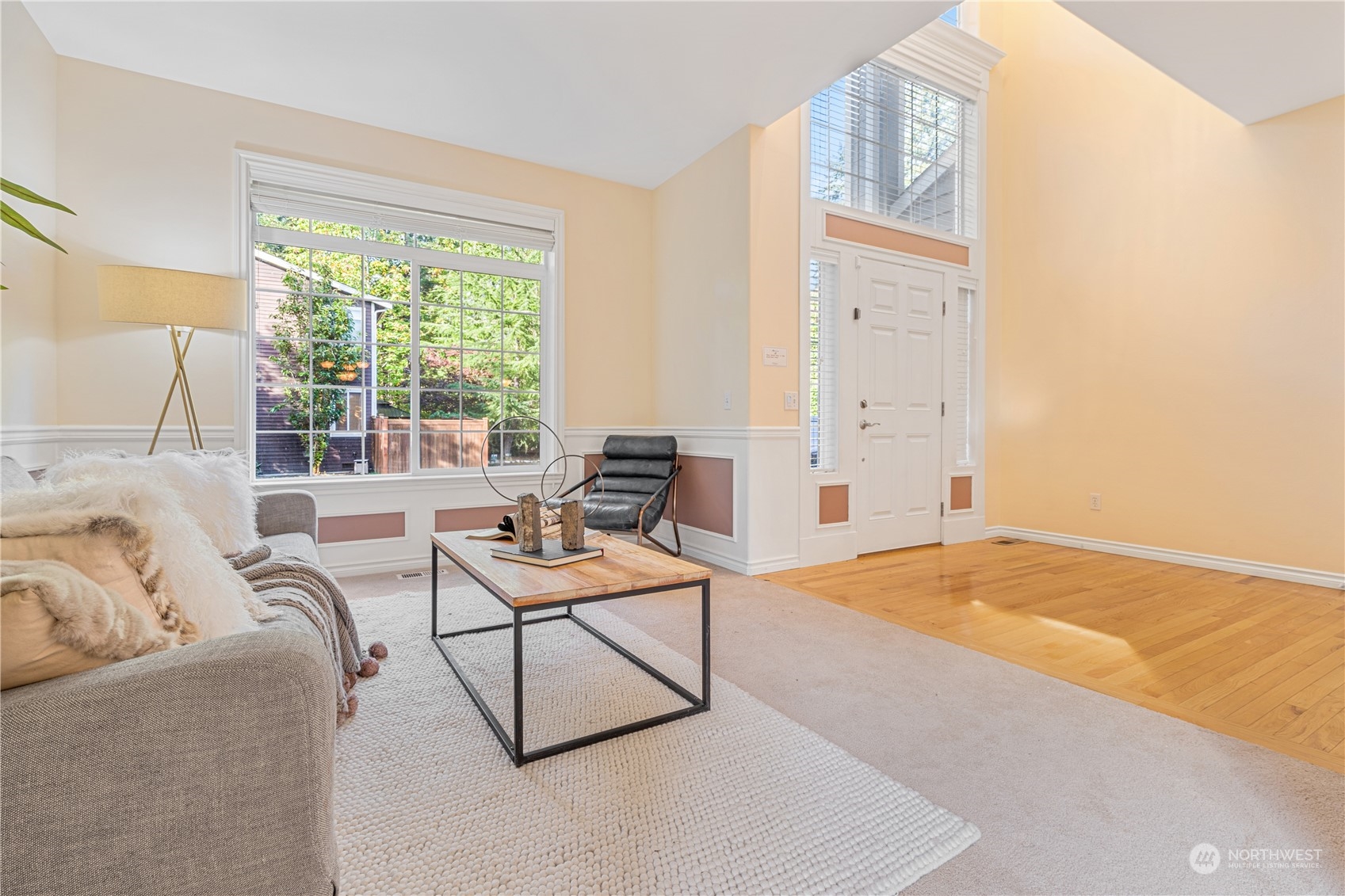 18529 33rd Avenue Southeast Bothell, WA 98012 - Photo 6 of 40 a living room with furniture and a large window
