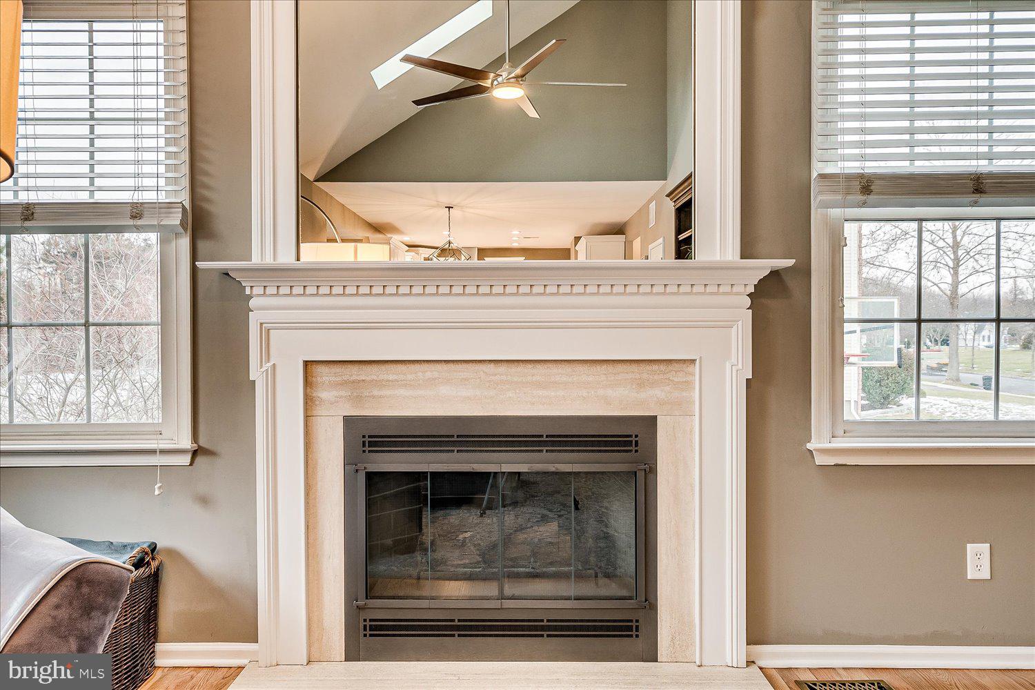 30 Witmer Way Robbinsville, NJ 08691 - Photo 20 of 48 a view of living room with a fireplace and windows