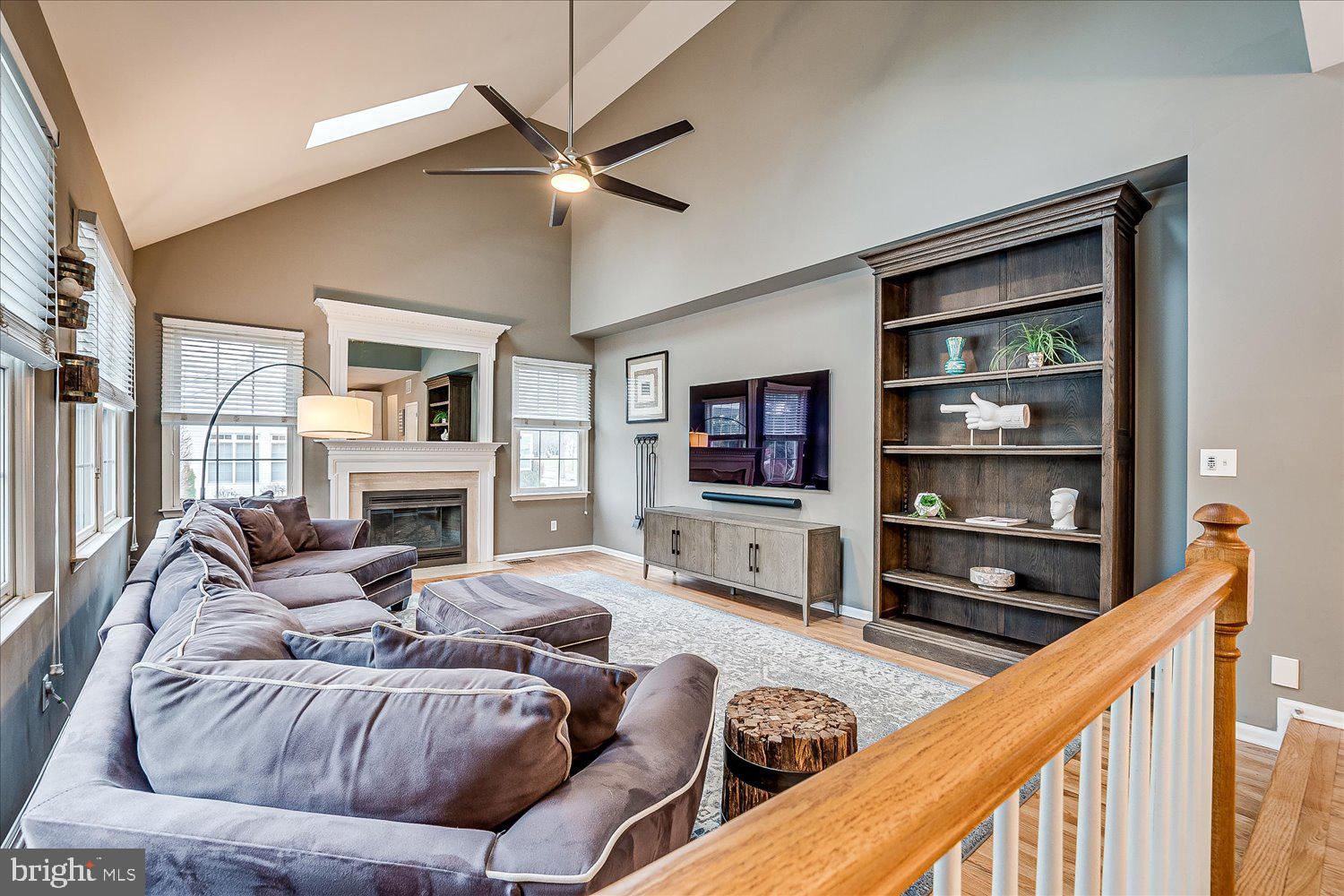 30 Witmer Way Robbinsville, NJ 08691 - Photo 22 of 48 a living room with furniture fireplace and a flat screen tv