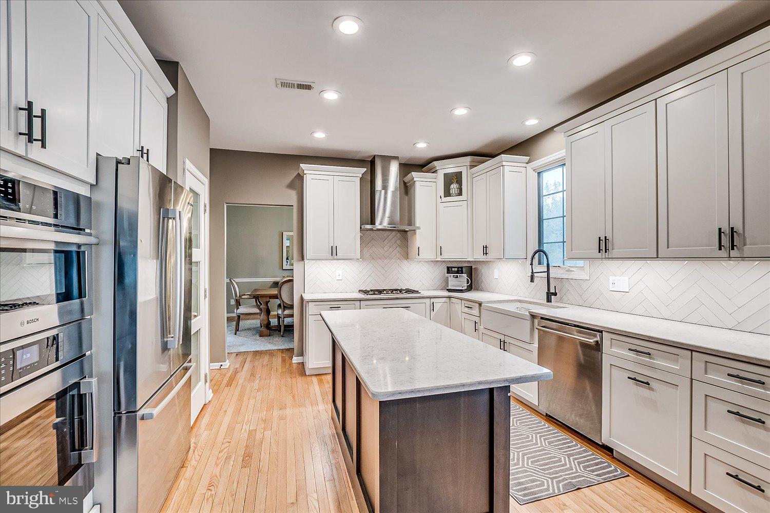 30 Witmer Way Robbinsville, NJ 08691 - Photo 38 of 48 a kitchen with a sink stove and refrigerator