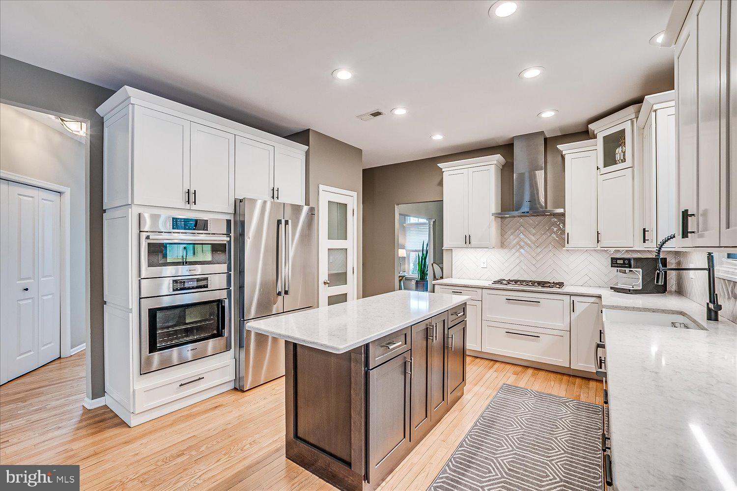 30 Witmer Way Robbinsville, NJ 08691 - Photo 5 of 48 a large kitchen with stainless steel appliances granite countertop a large stove a sink and a refrigerator