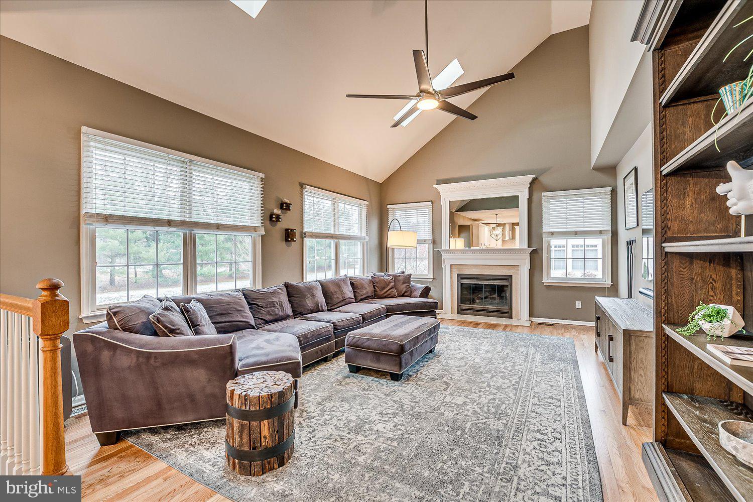 30 Witmer Way Robbinsville, NJ 08691 - Photo 6 of 48 a living room with fireplace furniture and a large window
