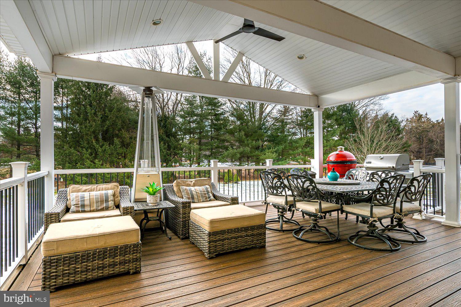 30 Witmer Way Robbinsville, NJ 08691 - Photo 9 of 48 a sitting area with furniture on wooden deck