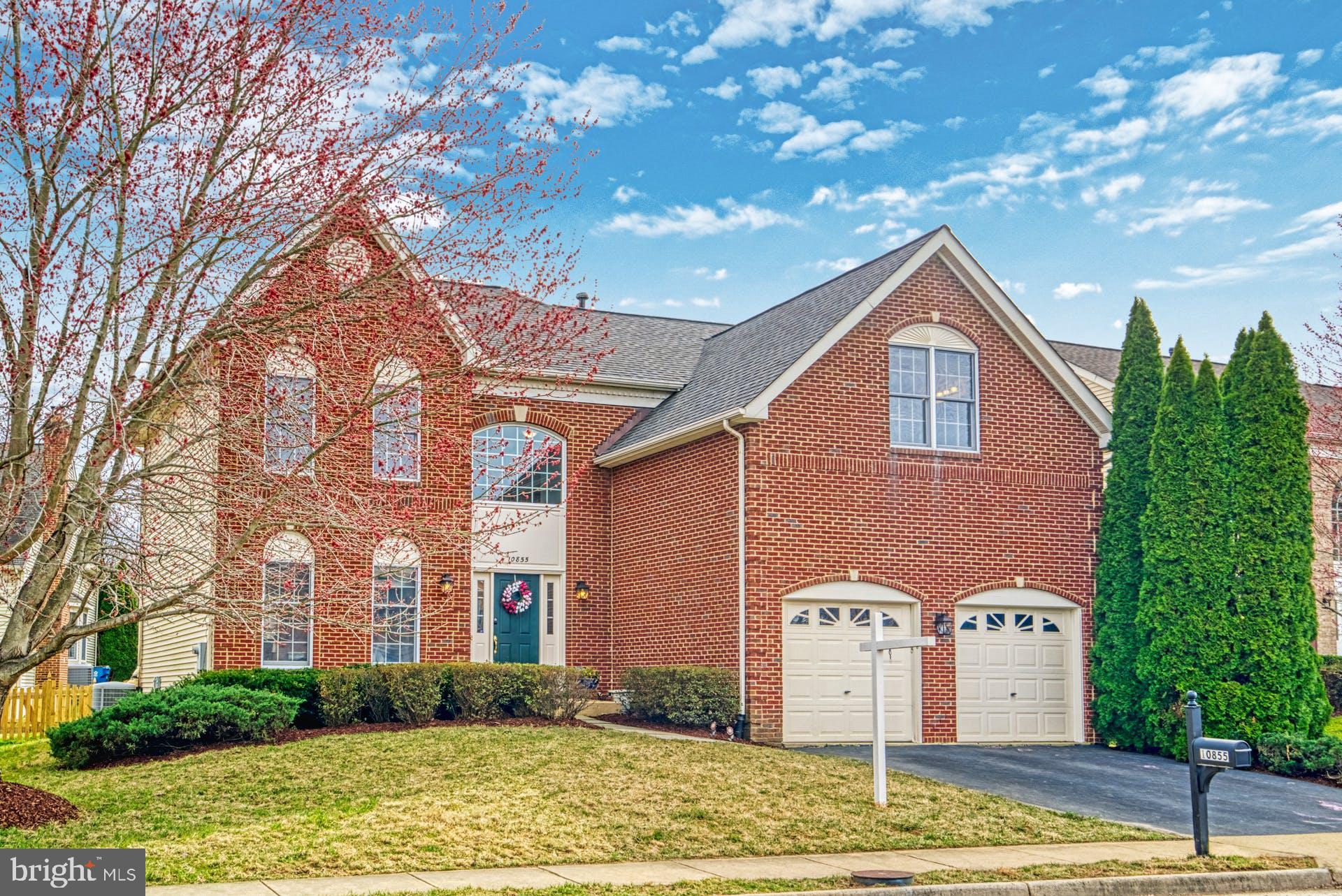10855 Hunter Gate Way Reston, VA 20194 - Photo 1 of 57 a front view of a house with garden