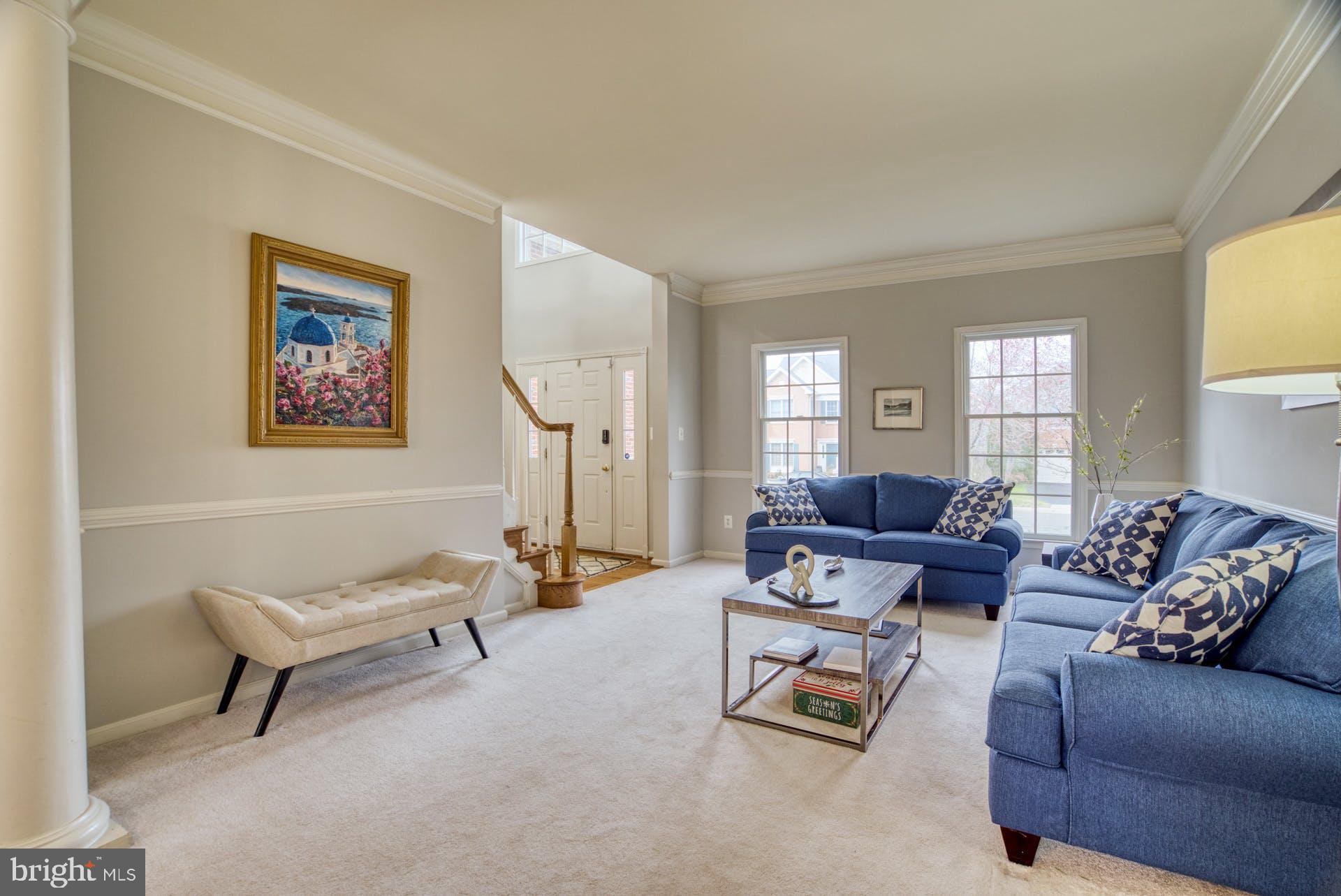 10855 Hunter Gate Way Reston, VA 20194 - Photo 13 of 57 a living room with furniture and a potted plant