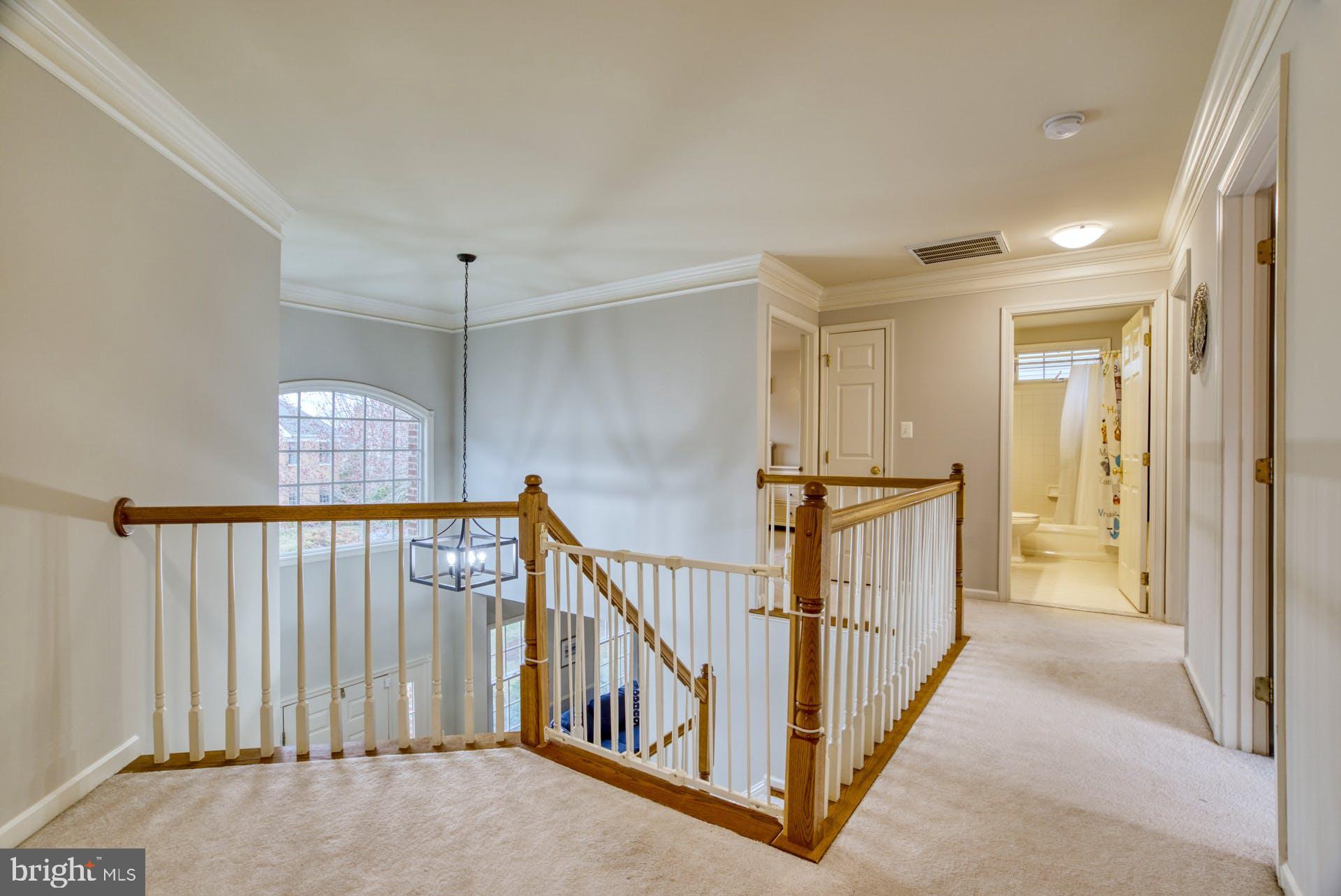 10855 Hunter Gate Way Reston, VA 20194 - Photo 19 of 57 a view of a hallway with a window