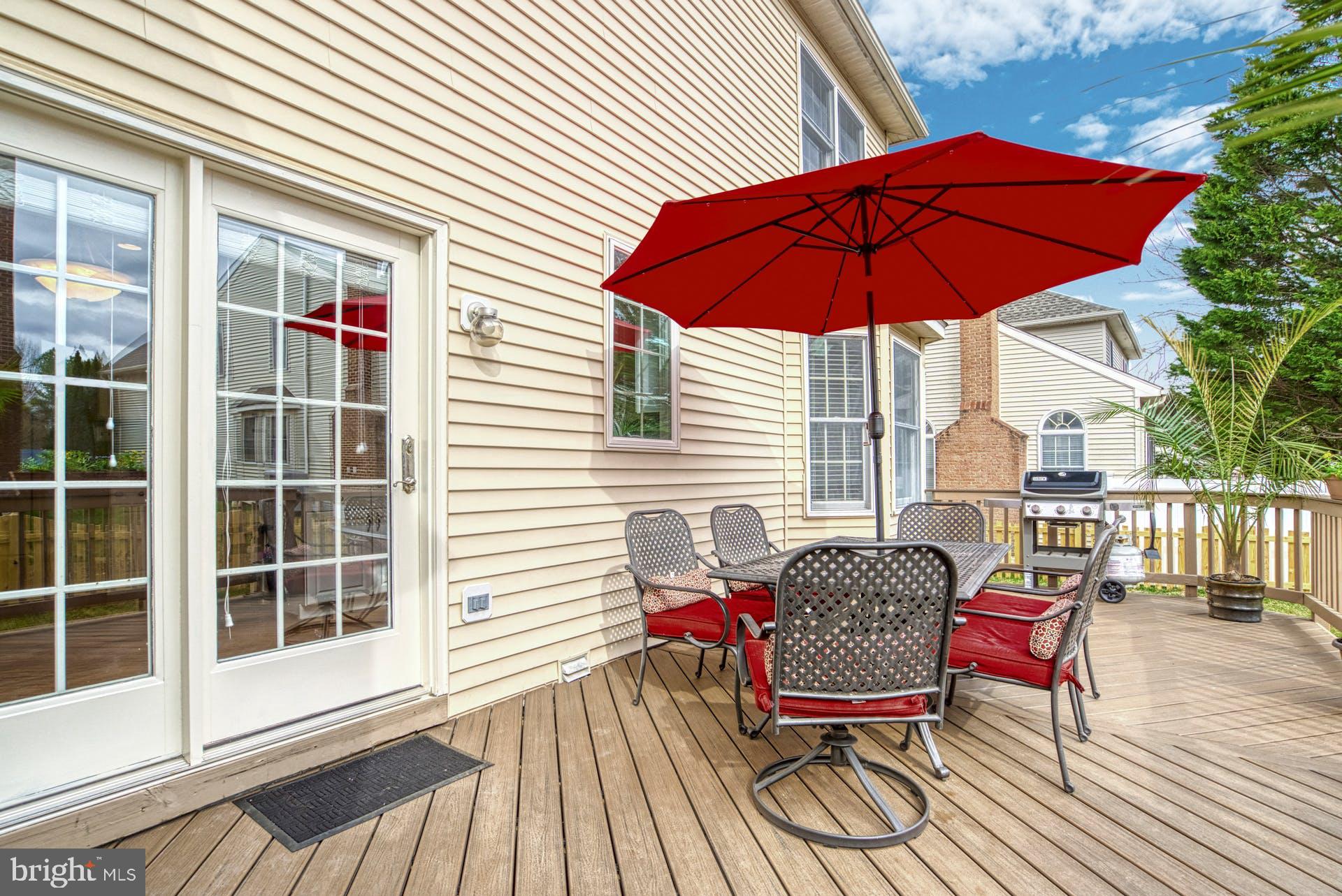 10855 Hunter Gate Way Reston, VA 20194 - Photo 40 of 57 a view of sitting area with furniture and wooden deck