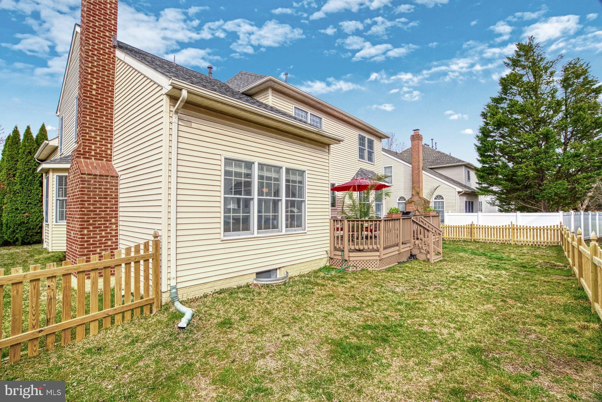 10855 Hunter Gate Way Reston, VA 20194 - Photo 43 of 57 a house view with a garden space