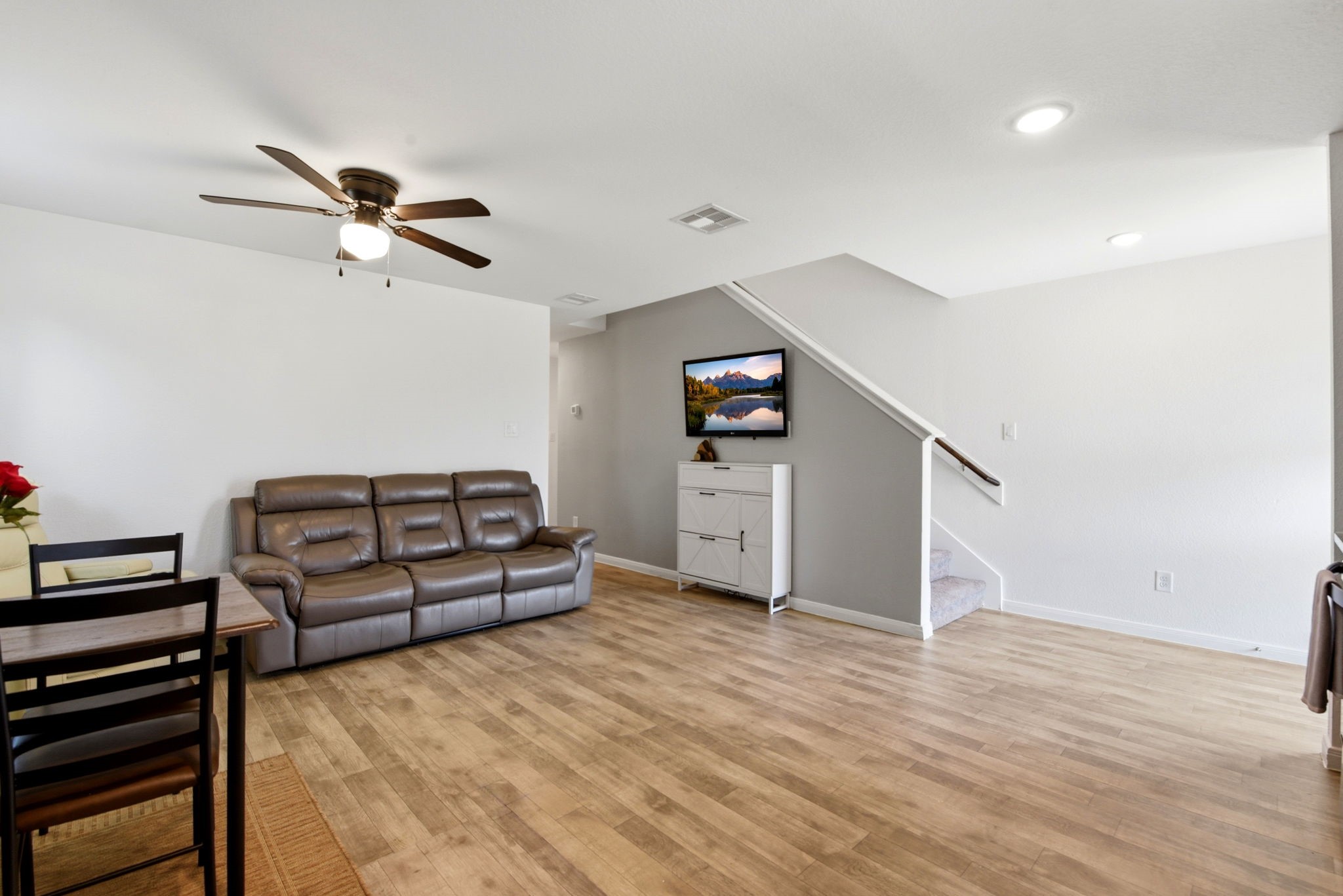 9819 Emerald Stone Way Conroe, TX 77306 - Photo 13 of 38 a bedroom with furniture and a ceiling fan