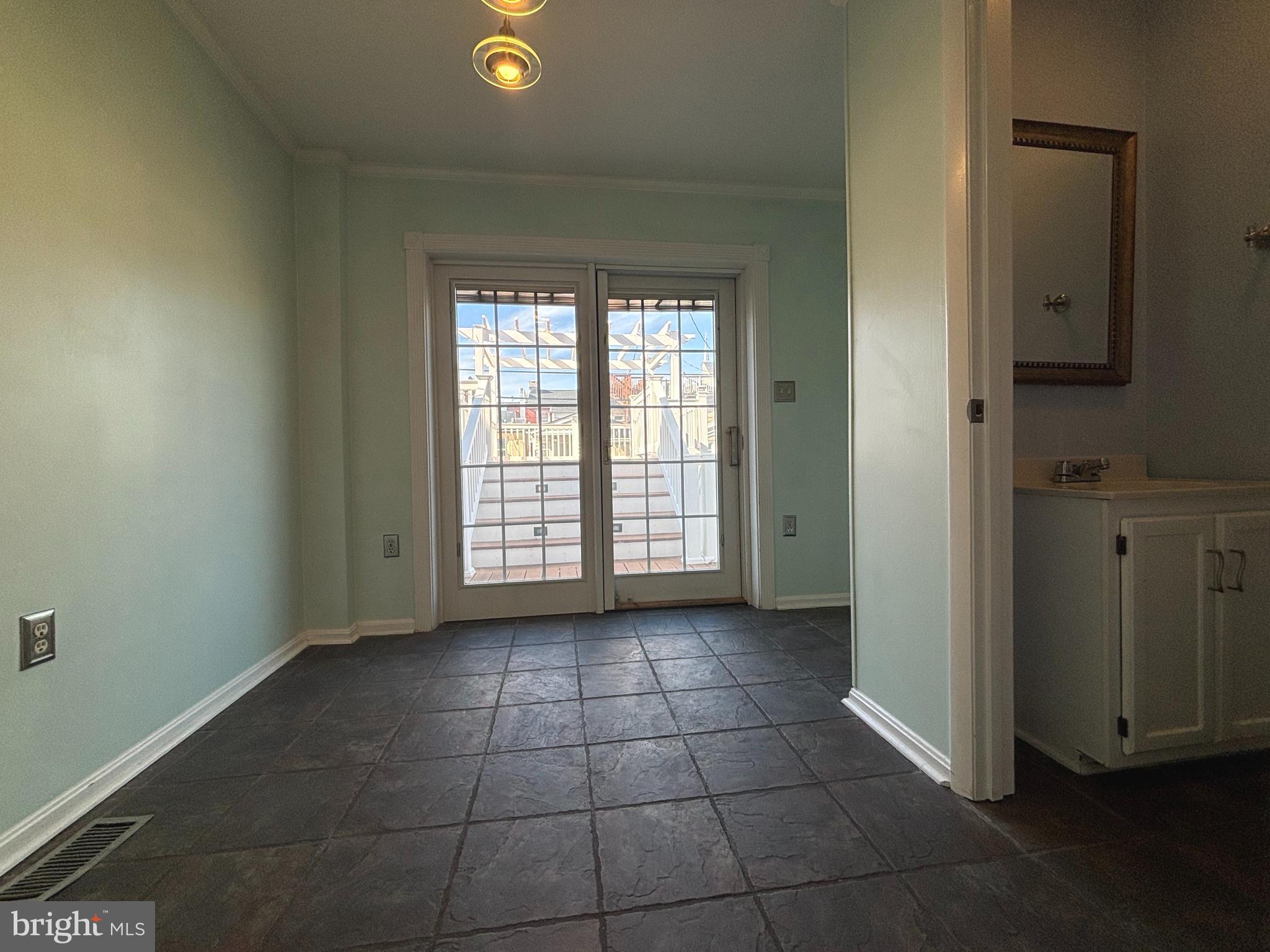 1218 Riverside Avenue Baltimore, MD 21230 - Photo 12 of 38 a view of an empty room with a window