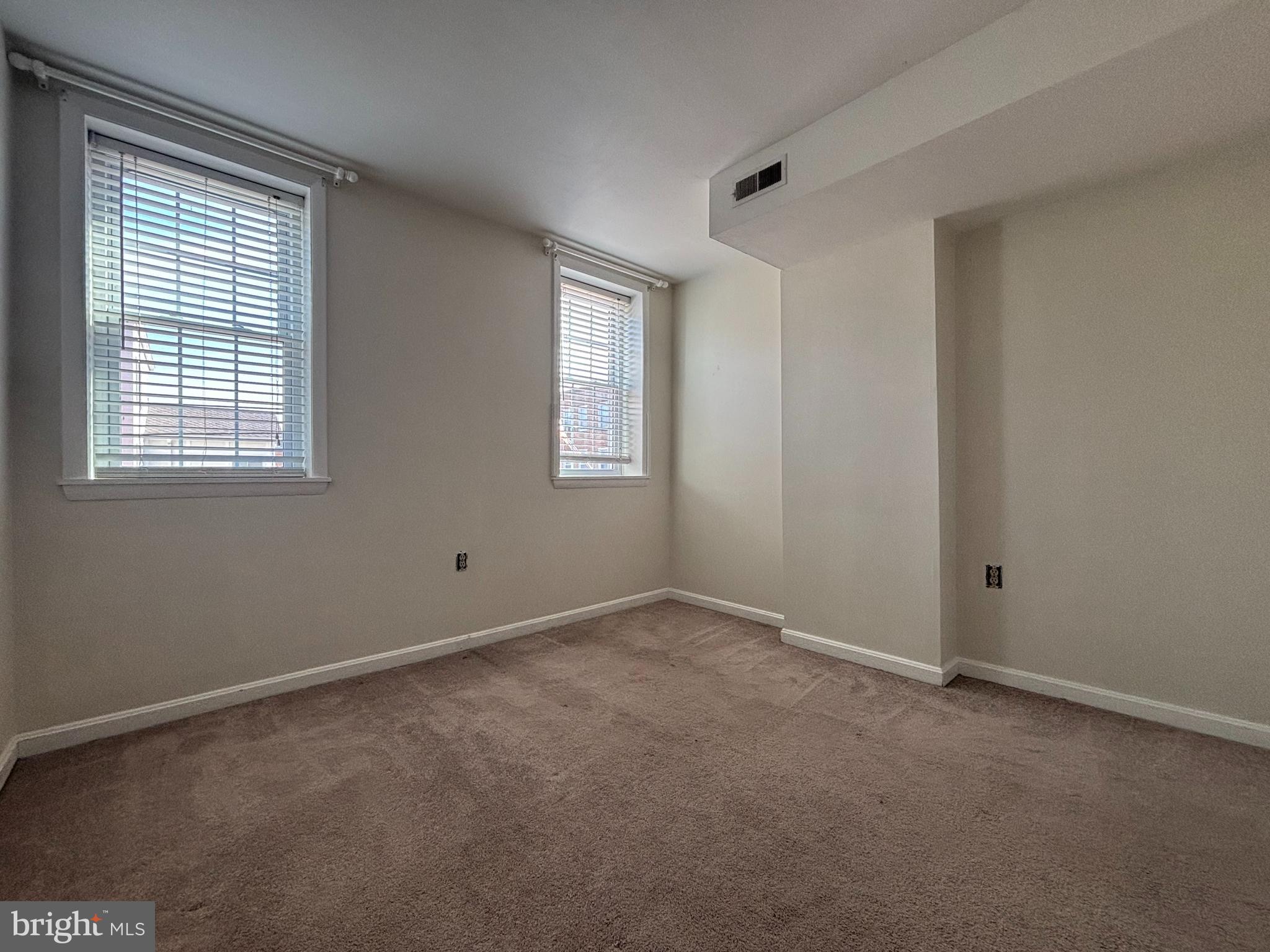 1218 Riverside Avenue Baltimore, MD 21230 - Photo 15 of 38 an empty room with a window