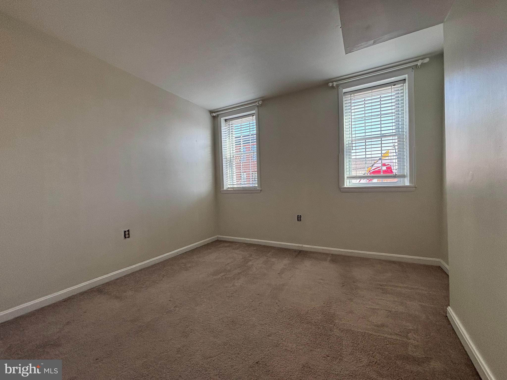 1218 Riverside Avenue Baltimore, MD 21230 - Photo 16 of 38 an empty room with windows