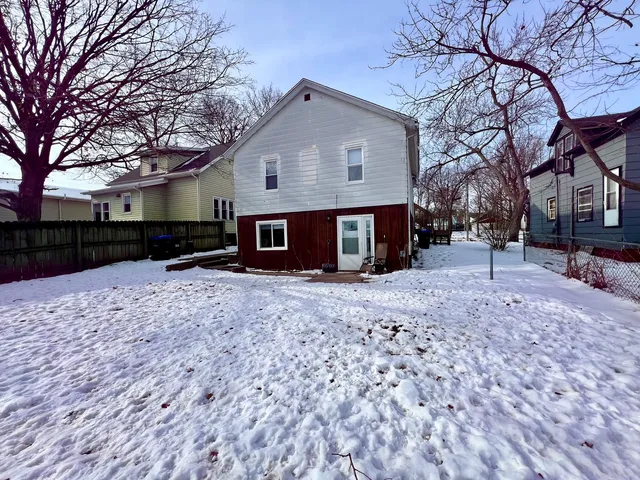 a bed room with a bed and a couch