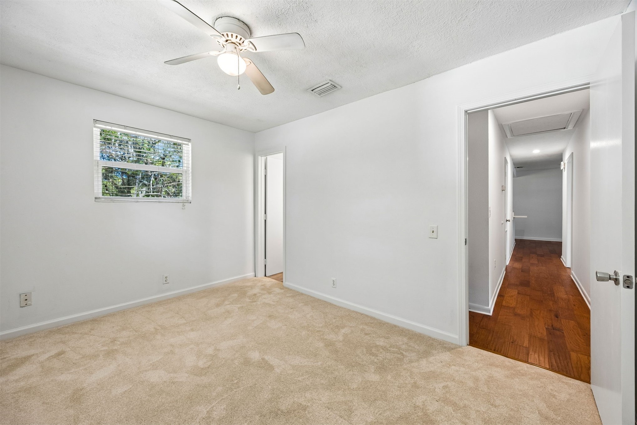 2441 Amelia Road Fernandina Beach, FL 32034 - Photo 28 of 36 a view of a big room with closet and a ceiling fan
