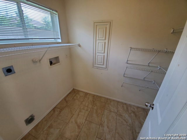 25714 Gold Yarrow San Antonio, TX 78260 - Photo 13 of 15 a view of a room that has a window