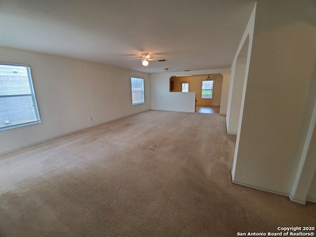 25714 Gold Yarrow San Antonio, TX 78260 - Photo 4 of 15 an empty room with windows and entrance