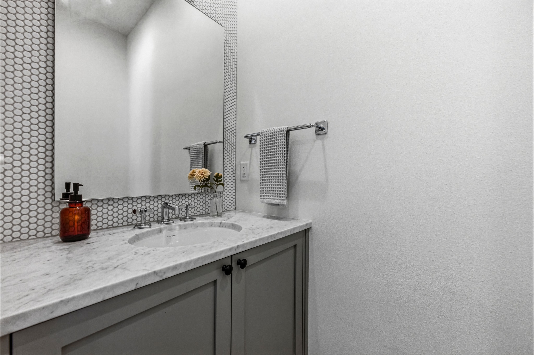 2512 Watkins Way Austin, TX 78746 - Photo 13 of 40 The powder bath on the second floor is nicely appointed