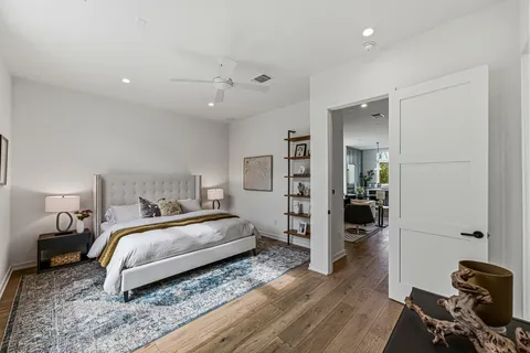 a bedroom with a bed and a view of bathroom