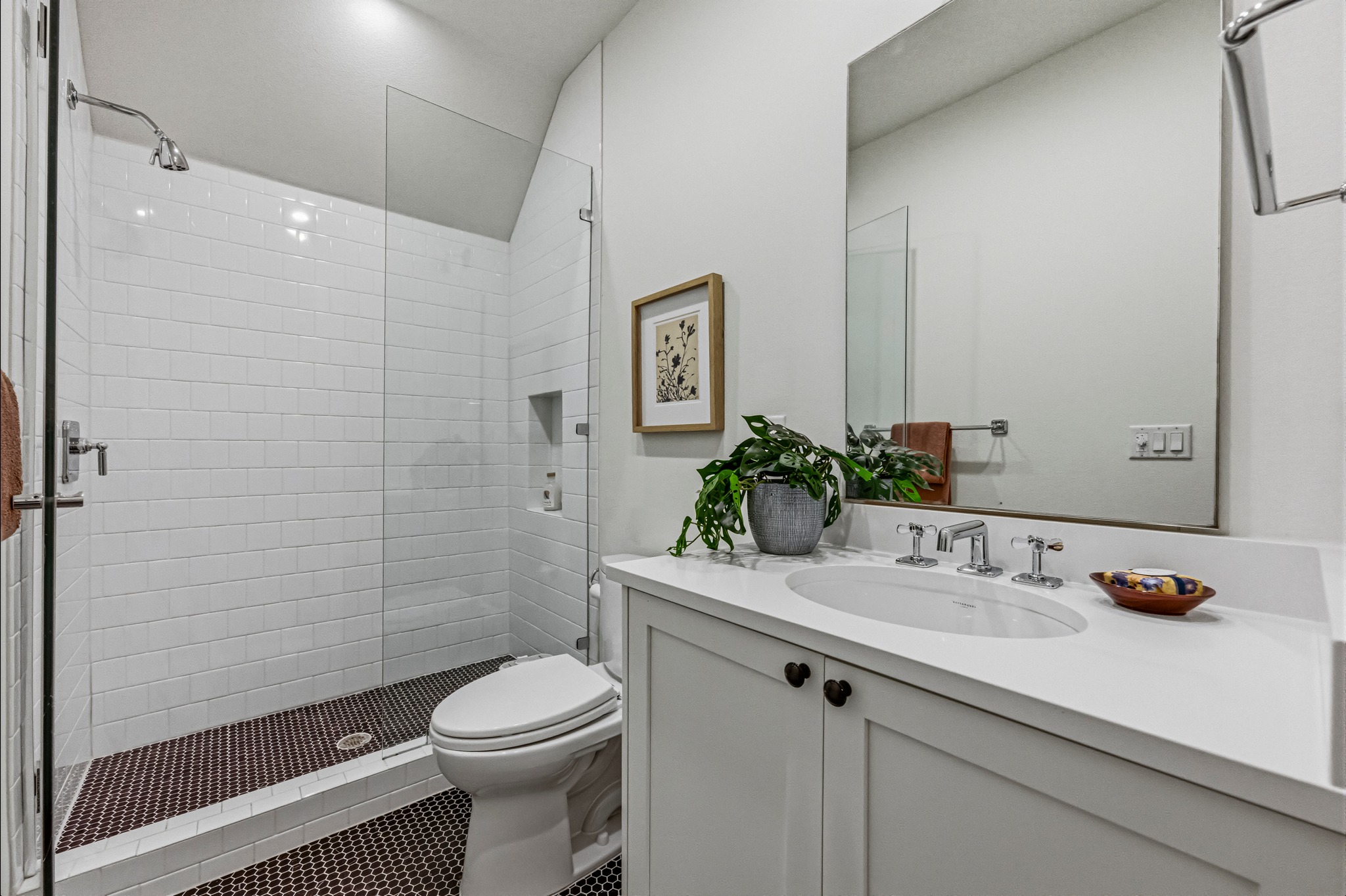 2512 Watkins Way Austin, TX 78746 - Photo 31 of 40 This bathroom serves the second bedroom as well as the family room.