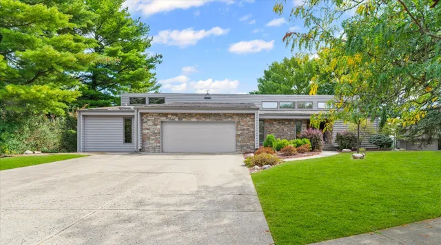 a view of a house with a swimming pool