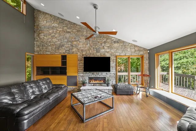 a kitchen with stainless steel appliances granite countertop a refrigerator a sink and dishwasher