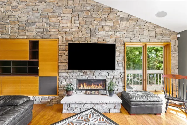 a bed room with a bed and a ceiling fan