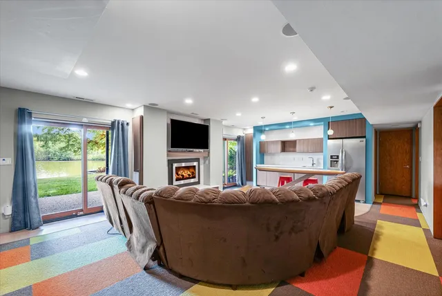 a view of a balcony with wooden floor and outdoor space