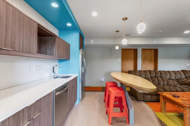 a view of a lake with houses in the back