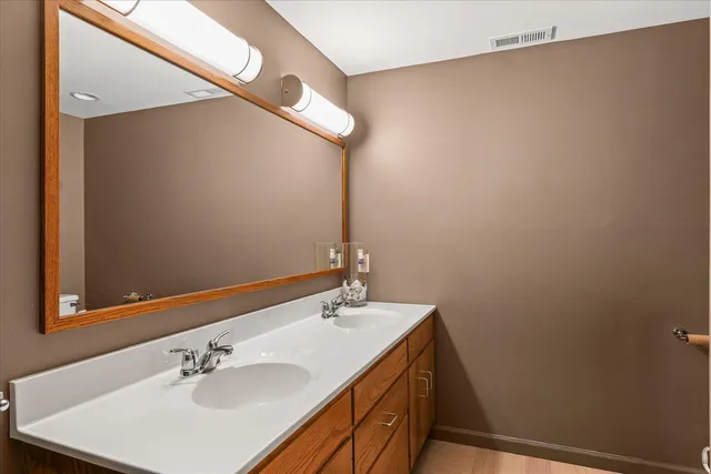 a view of a lake with a house in the background