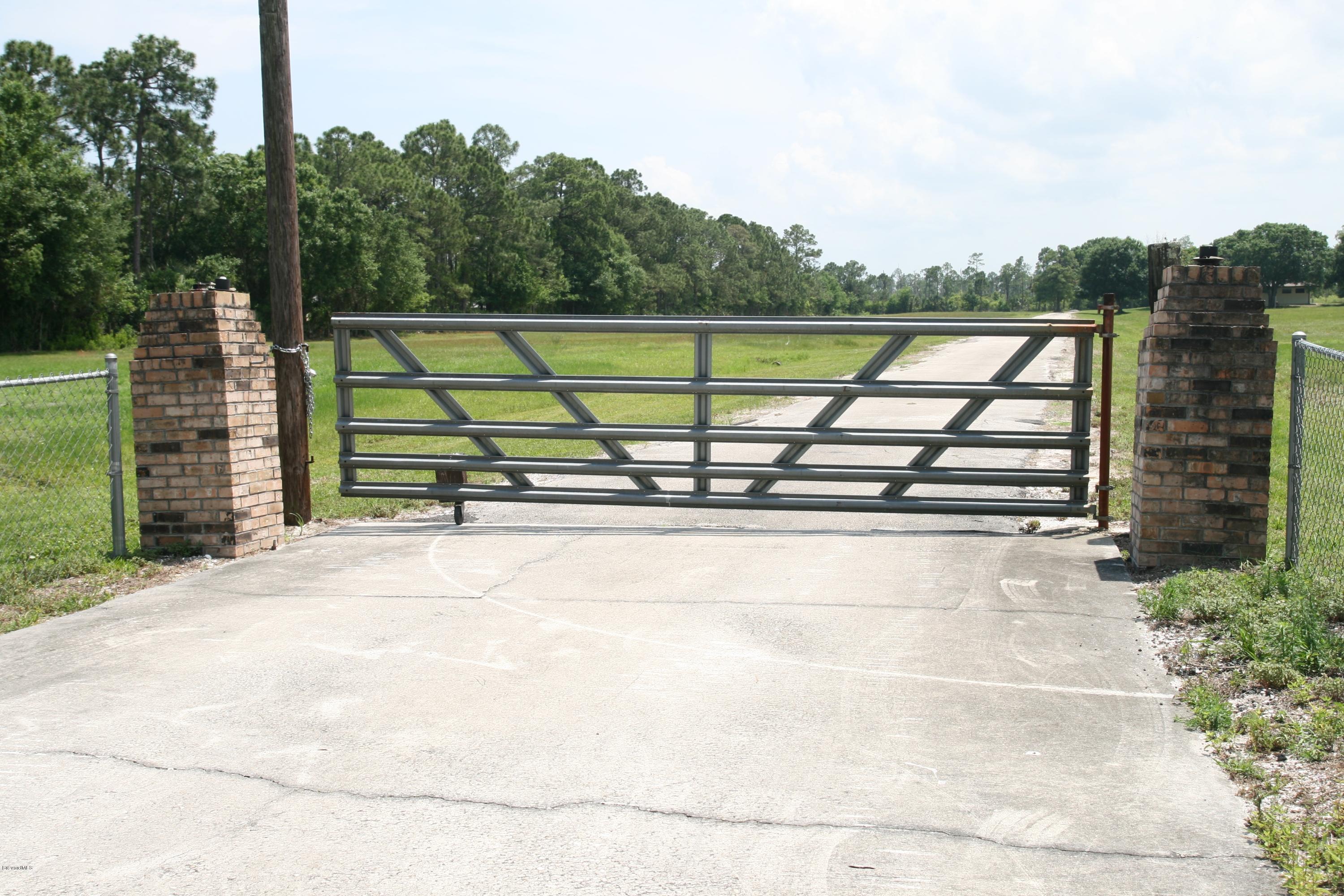 4303 Rayburn Road Cocoa, FL 32926 - Photo 25 of 26 Gated Entrance