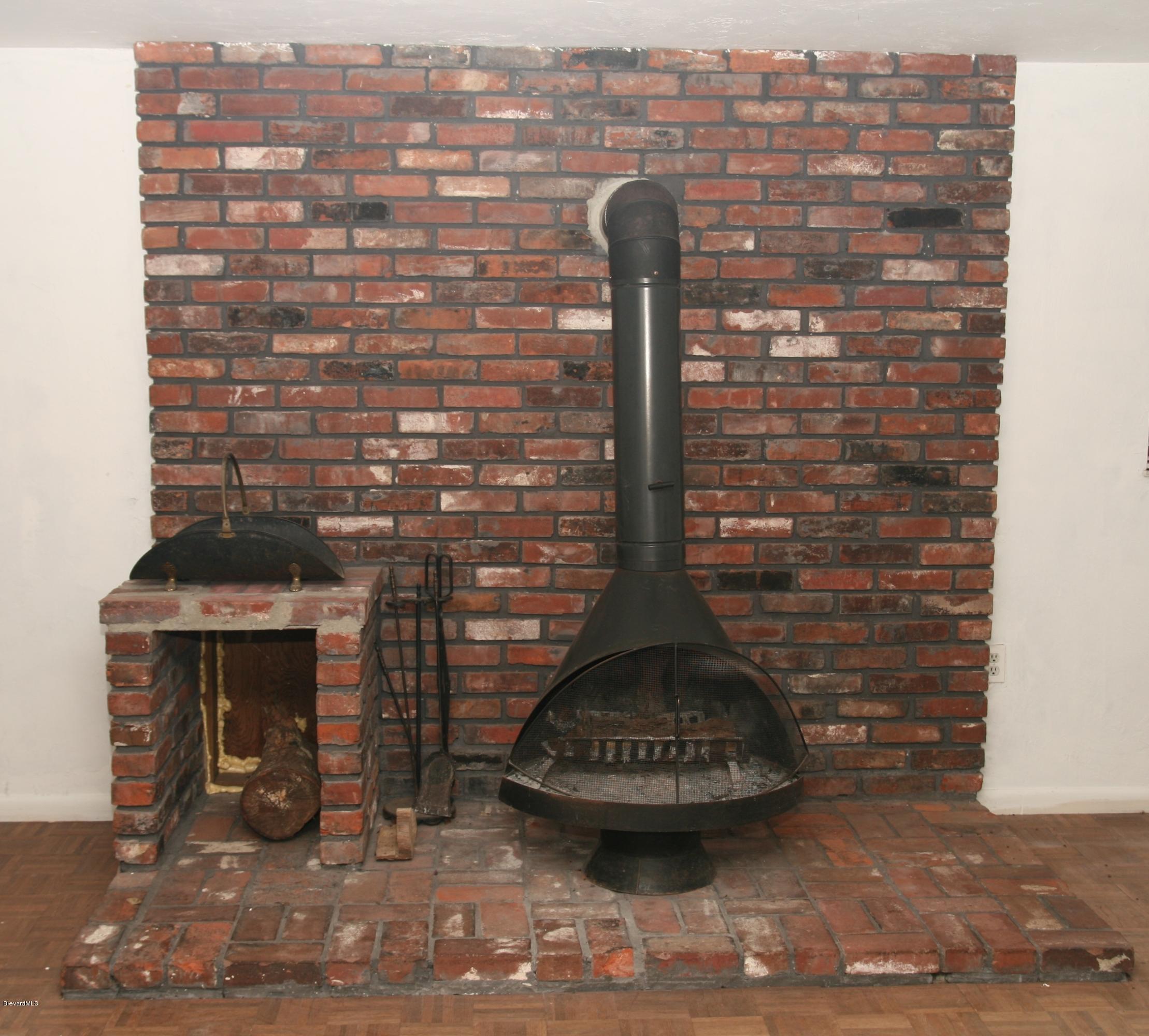 4303 Rayburn Road Cocoa, FL 32926 - Photo 8 of 26 fireplace