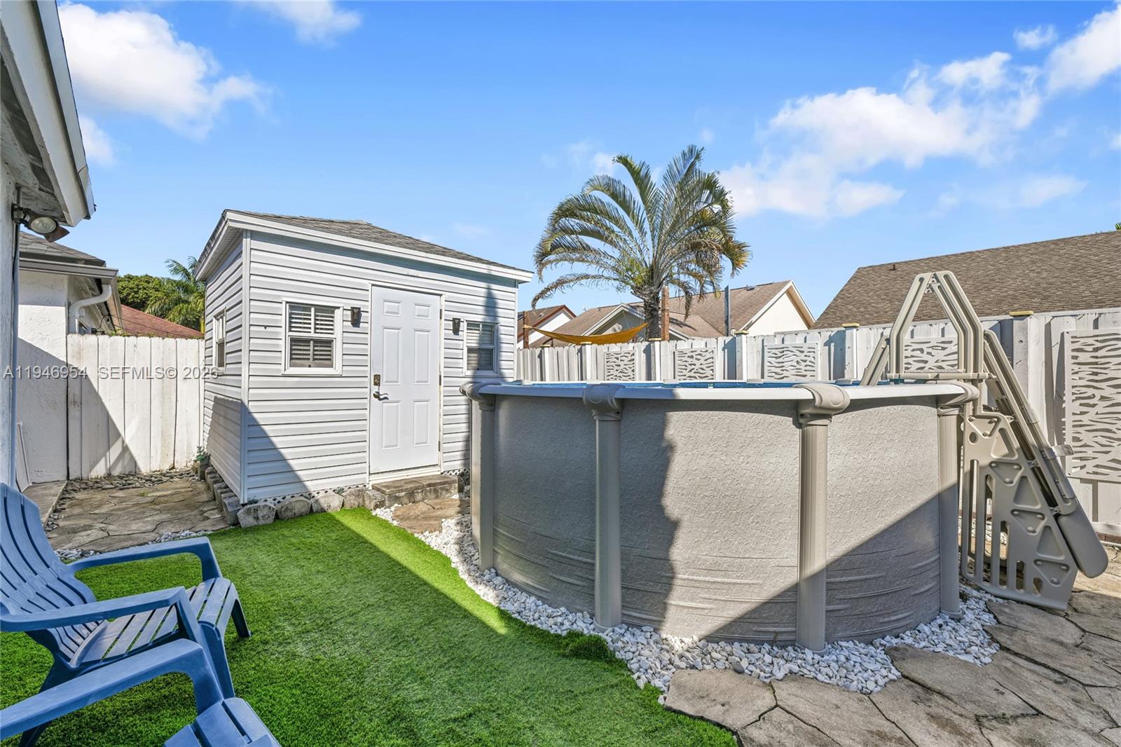 24955 Southwest 129th Path Homestead, FL 33032 - Photo 24 of 26 a view of a house with backyard