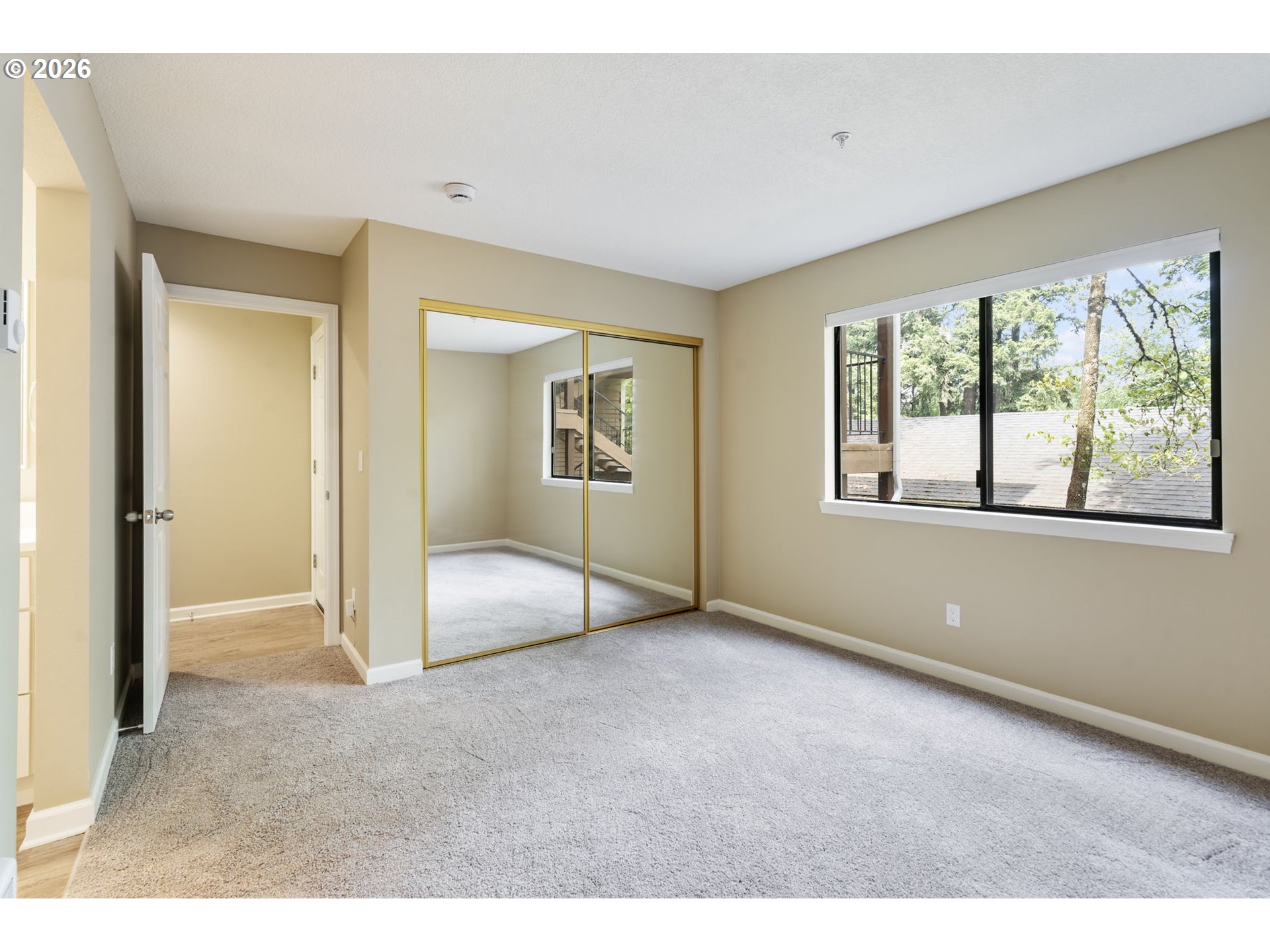9967 Southeast Talbert Street Clackamas, OR 97015 - Photo 20 of 33 a view of an empty room with a window