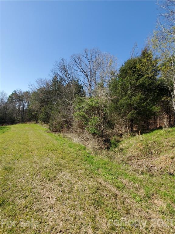 1275 Carl Road York, SC 29745 - Photo 1 of 7 a view of a yard with an outdoor space and seating area