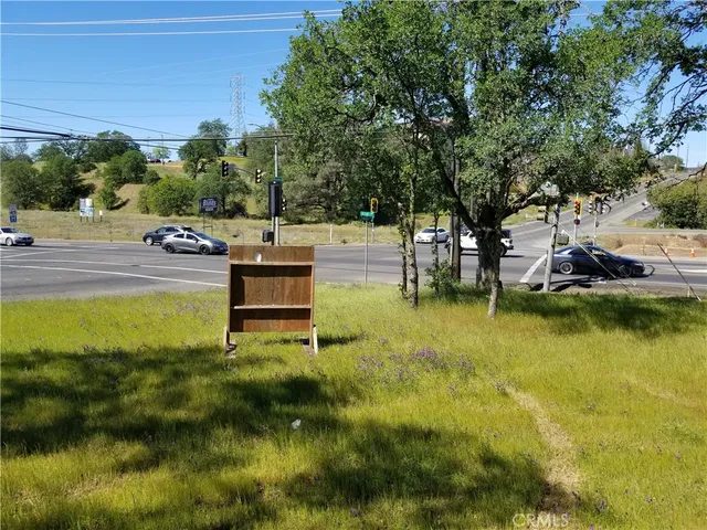 a swimming pool with outdoor seating and yard