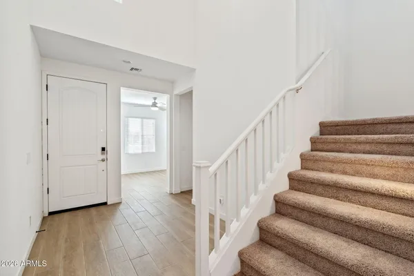 a view of staircase with white walls and white walls