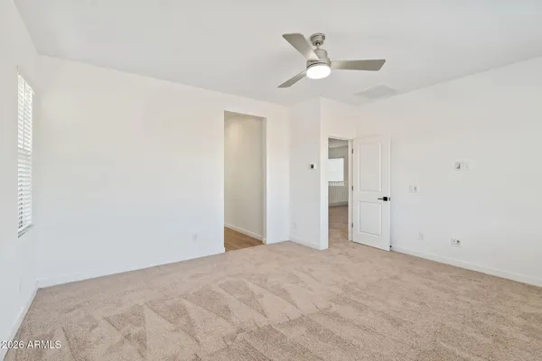 a view of a room with a wardrobe space
