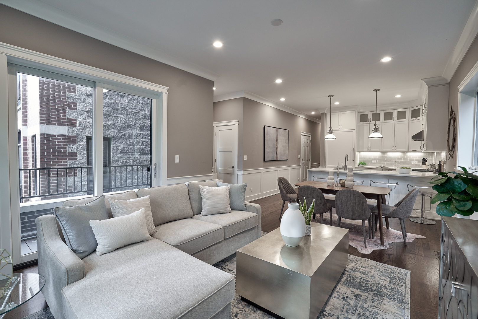 3044 North Racine Avenue, Unit 2 Chicago, IL 60657 - Photo 2 of 27 a living room with furniture and a large window