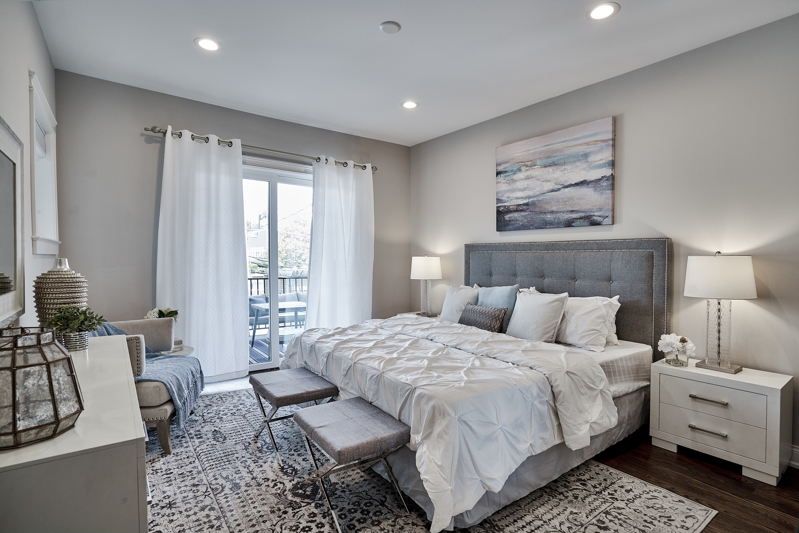 3044 North Racine Avenue, Unit 2 Chicago, IL 60657 - Photo 17 of 27 a bedroom with a bed and glass walk in closet