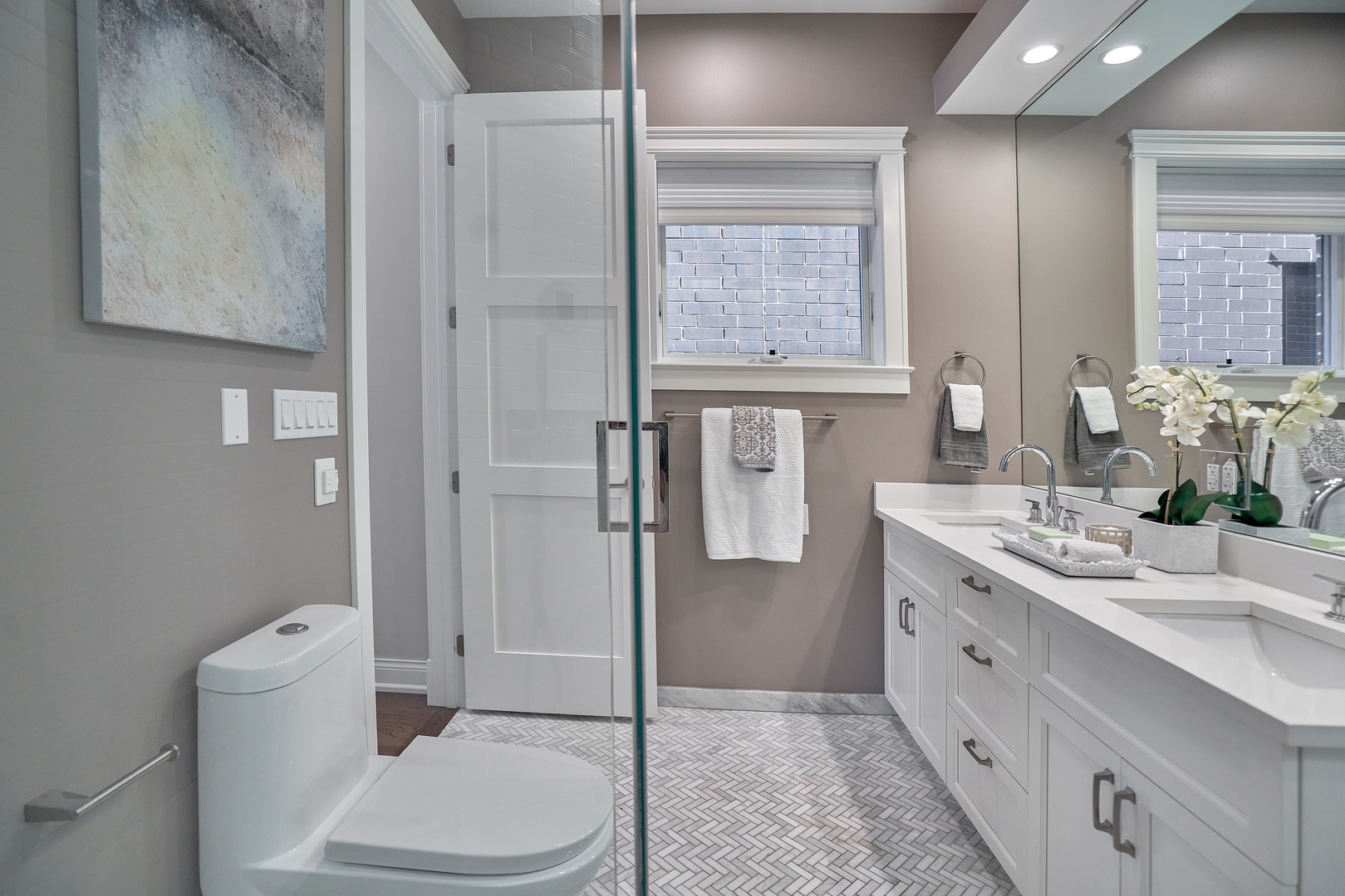 3044 North Racine Avenue, Unit 2 Chicago, IL 60657 - Photo 20 of 27 a bathroom with a sink a toilet and shower